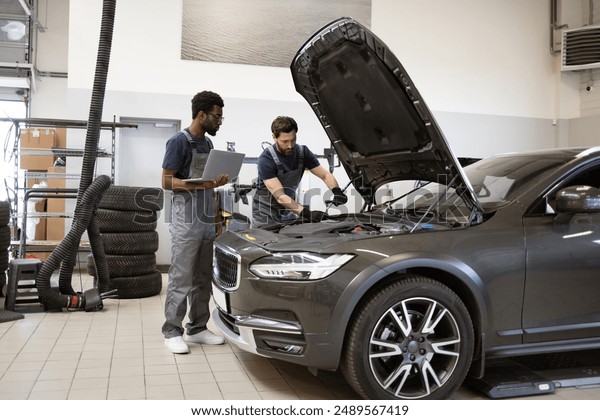 24,119 自動車整備工 Stock Photos, High-Res Pictures, and Images - Getty Images自動車修理工場, 修理, 商談